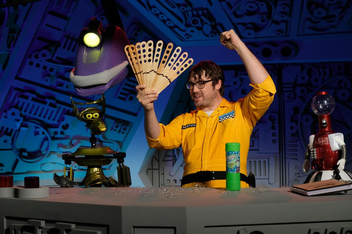 Gypsy, Crow T. Robot, Jonah Ray and Tom Servo on set of the 'Mystery Science Theater 3000' revival.