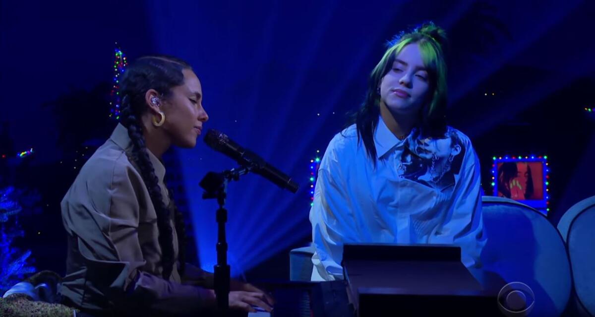 Singer-songwriters Alicia Keys, left, and Billie Eilish sing Eilish's "Ocean Eyes" together on "The Late Late Show With James Corden."
