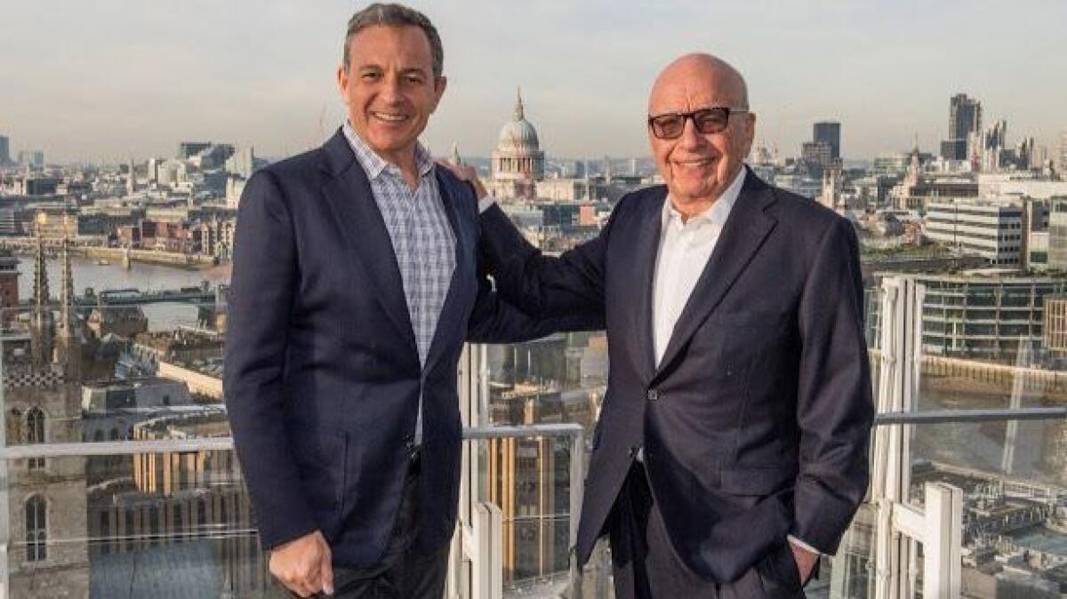Bob Iger, left, with Rupert Murdoch in an undated image.