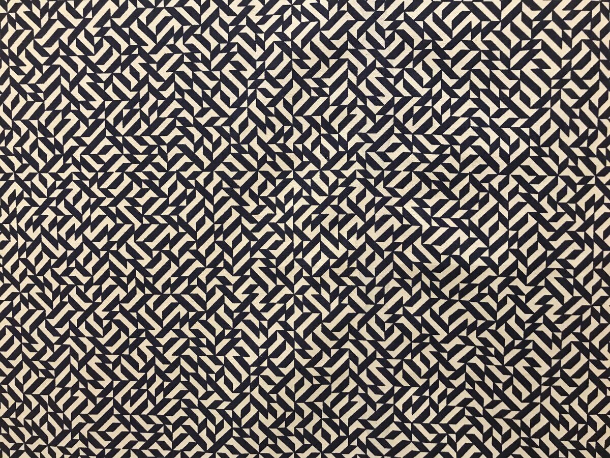 Detail from "Eclat," a black-and-white patterned fabric designed by Anni Albers in 1974 and manufactured by Knoll Textiles in 1976.