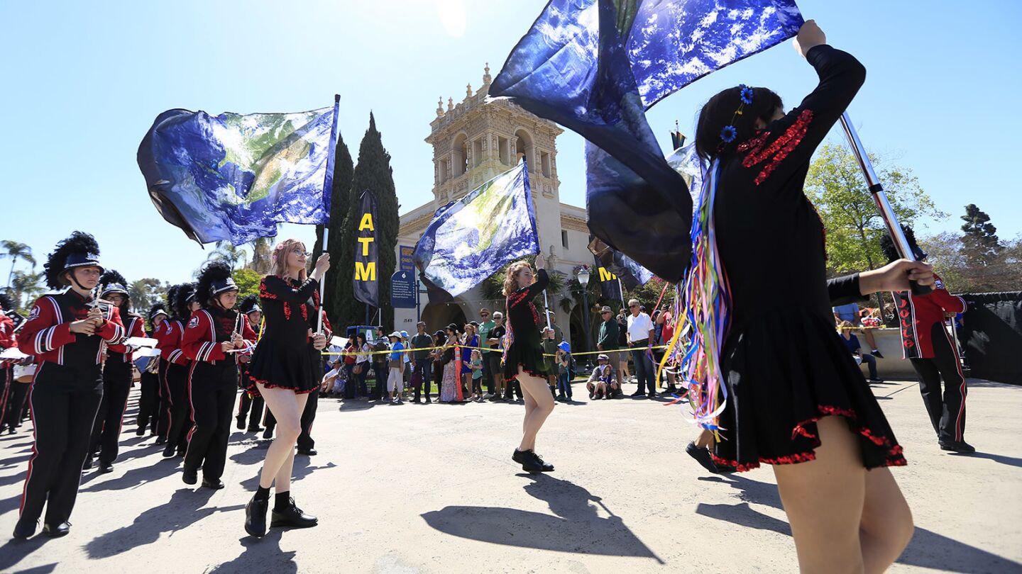 The La Jolla High band and color guard participate in the walking with the Earth Day parade at the 29th Annual EarthFair in Balboa Park on April 22, 2018. (Photo by K.C. Alfred/ San Diego Union -Tribune)