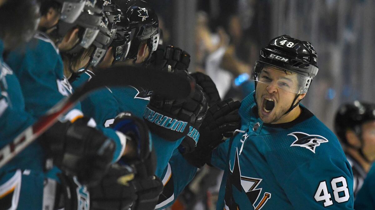 San Jose Sharks' Tomas Hertl is congratulated by teammates after scoring a goal against the Ducks during the third period in Game 4 of the Western Conference first round during the Stanley Cup playoffs on Wednesday.