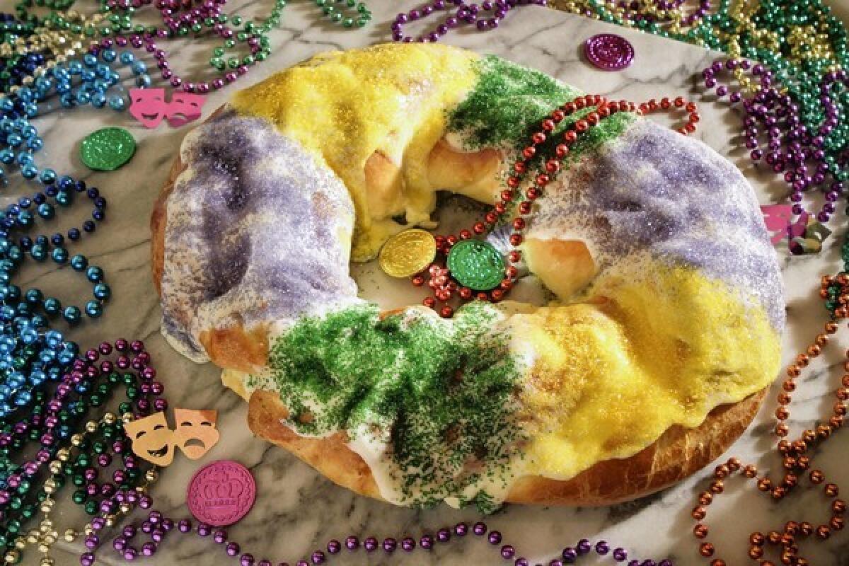 This recipe for Mardi Gras King Cake has a cream cheese and apple filling.