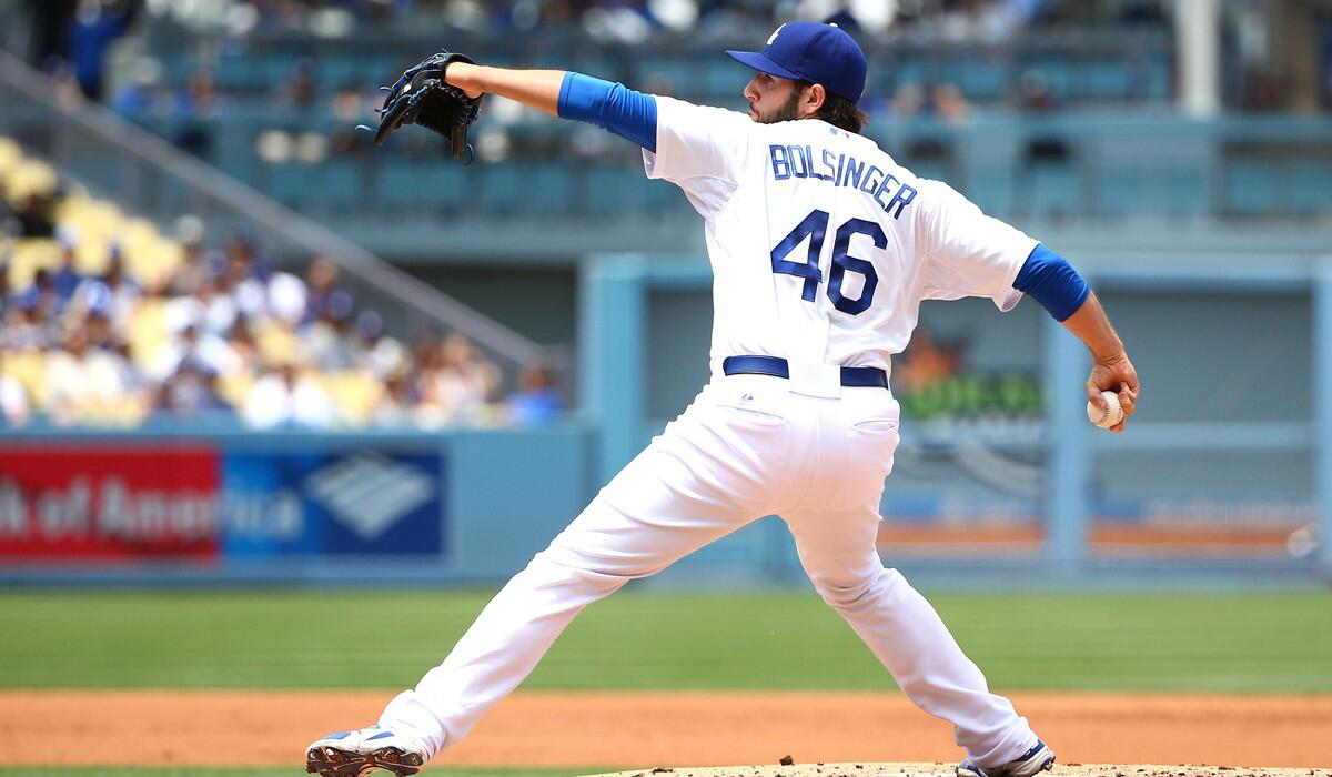 Dodgers pitcher Mike Bolsinger pitches during a 1-0 win against the Colorado Rockies at Dodger Stadium on on Sunday.