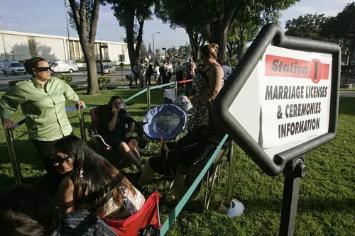 Couples wait at the Los Angeles County clerk's office.