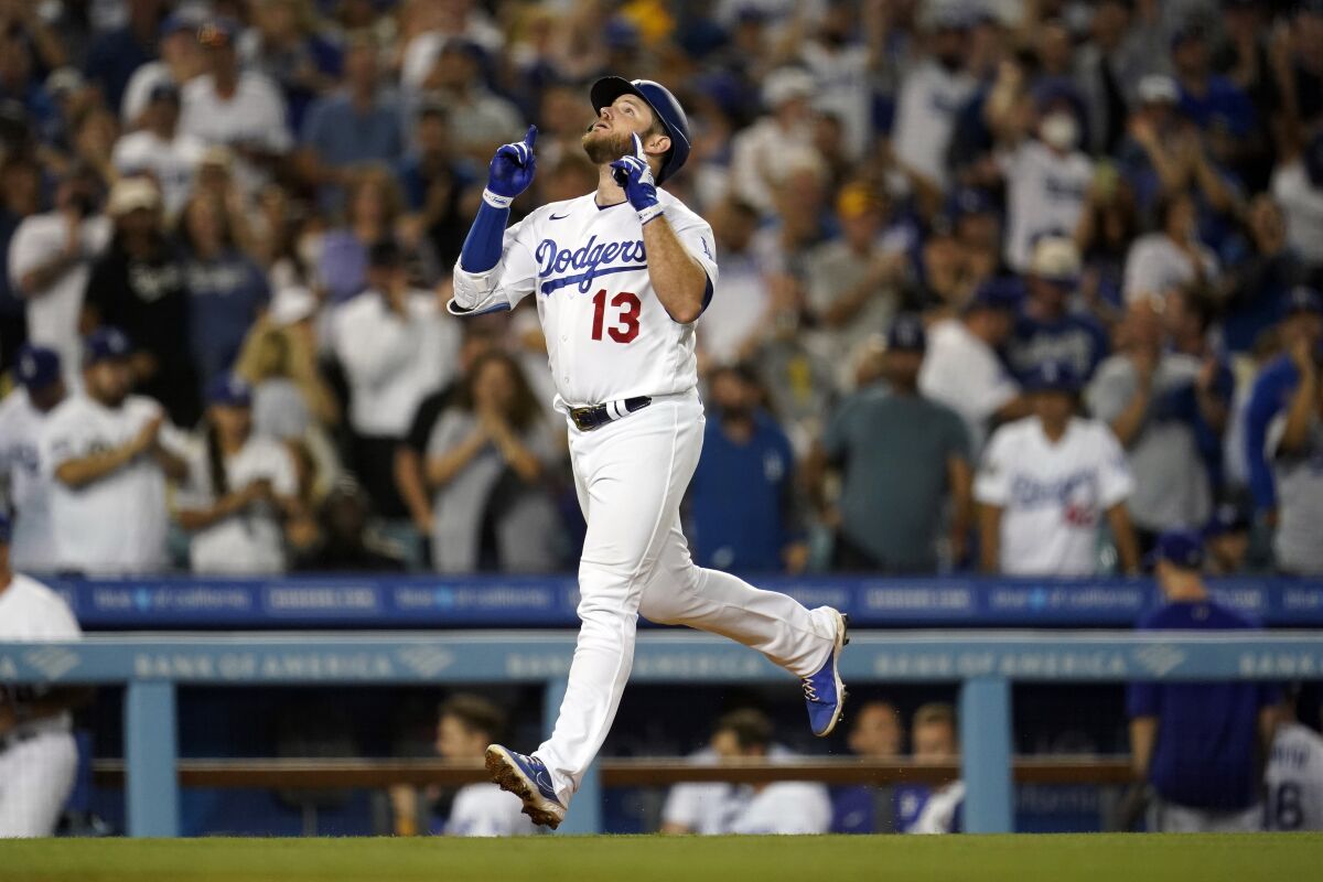 Dodgers' Max Muncy celebrates his solo home run.