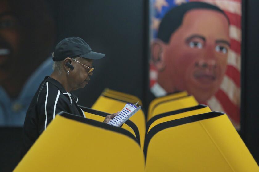 Los Angeles, CA., March 3, 2020 - A voter votes on Super Tuesday in Los Angeles at the Watts Labor Community Action Committee's Phoenix Hall on Sunday, March 2, 2020 in Los Angeles, California. (Jason Armond / Los Angeles Times)