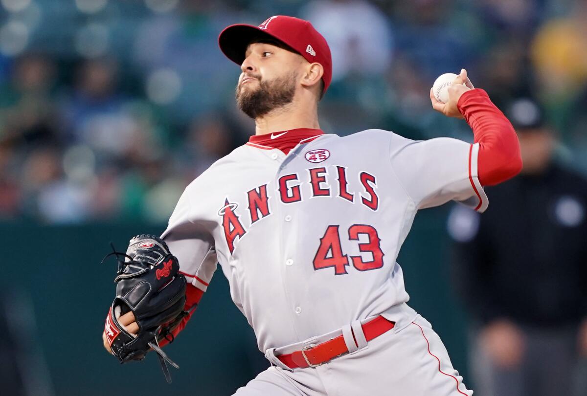 Angels pitcher Patrick Sandoval pitches against the Oakland Athletics in the bottom of the first on Wednesday in Oakland.