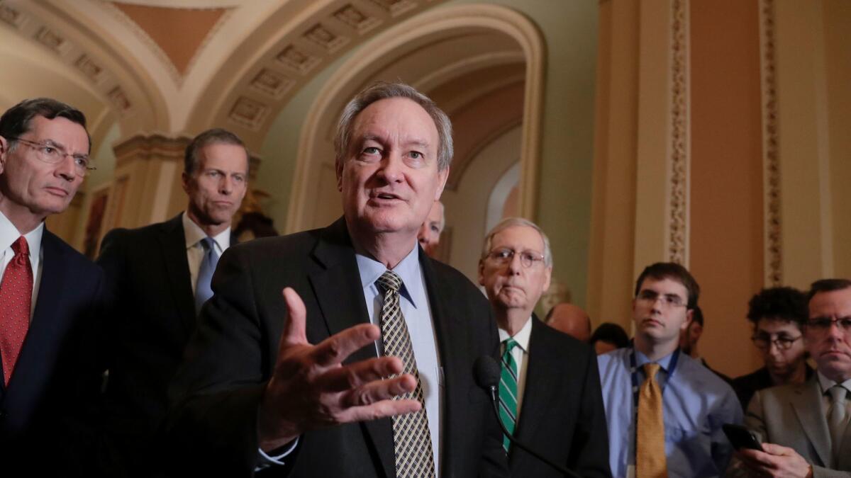 Sen. Mike Crapo (R-Idaho), chairman of the Senate Banking Committee, speaks with reporters on Tuesday about his banking deregulation bill.