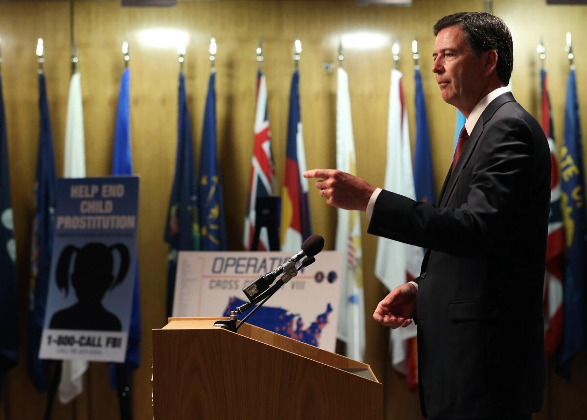 FBI Director James Comey speaks during a news conference on child sex trafficking at the agency's headquarters in Washington on Monday.