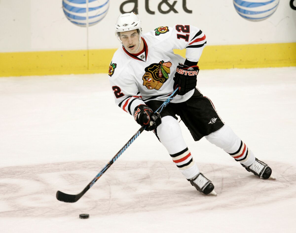 Chicago Blackhawks' Kyle Beach controls the puck during a game in 2008.