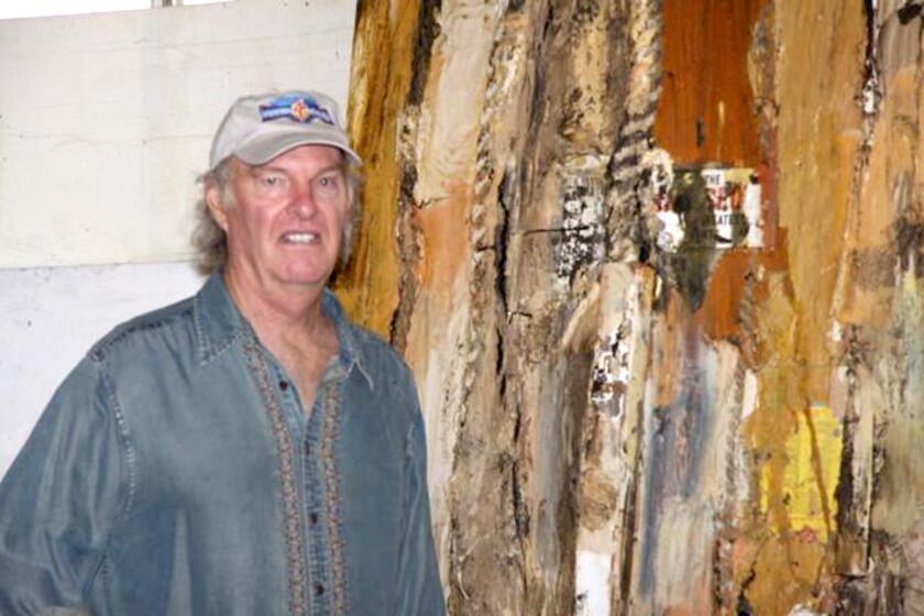 Dennis Hare works on his canvases in his large studio, which allows him to step back and view the work from a distance. Local artists will open their studios to visitors Dec. 8 and 9, 2012 for the second annual Redlands Area Holiday Studio Tour and Sale.