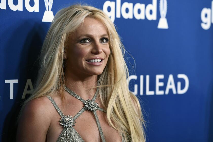 FILE - This April 12, 2018 file photo shows Britney Spears at the 29th annual GLAAD Media Awards in Beverly Hills, Calif. Spears has decided to focus on self-care as she goes through a rough stretch. She posted an image on Instagram Wednesday with the words, Fall in love with taking care of yourself. Mind. Body. Spirit. People magazine reports that worries for her father and the need to help take care of him after a life-threatening colon rupture last year have continued to take a toll on the pop star. (Photo by Chris Pizzello/Invision/AP, File)