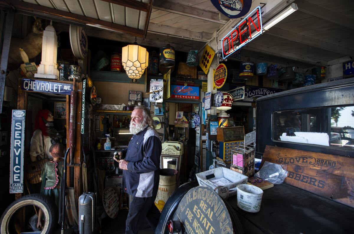 Joe Miracle, 70, the owner of Bay Auto Service in Costa Mesa, is an avid collector of treasures of a bygone era.