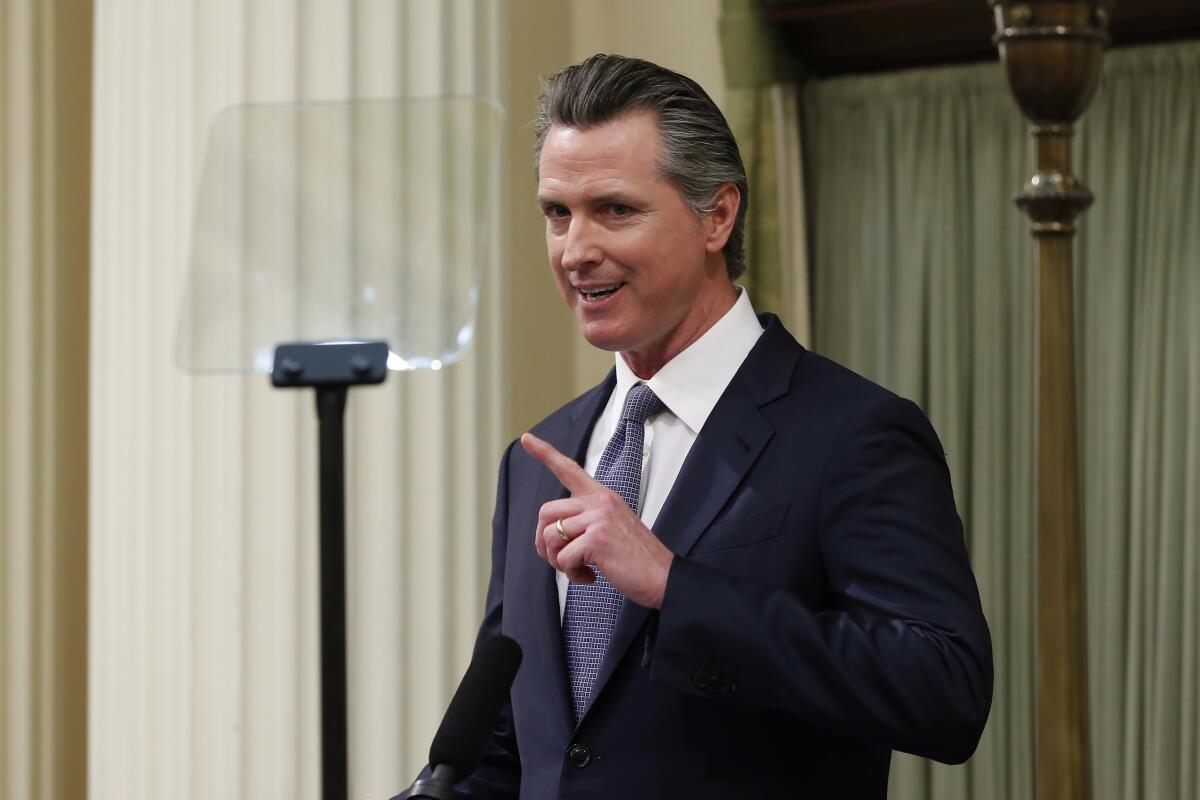 California Gov. Gavin Newsom delivers his State of the State address to a joint session of the legislature at the Capitol in Sacramento.