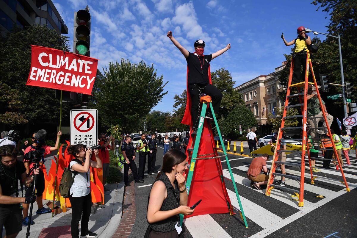 Environmental activists block an intersection in Washington on Sept. 23. 