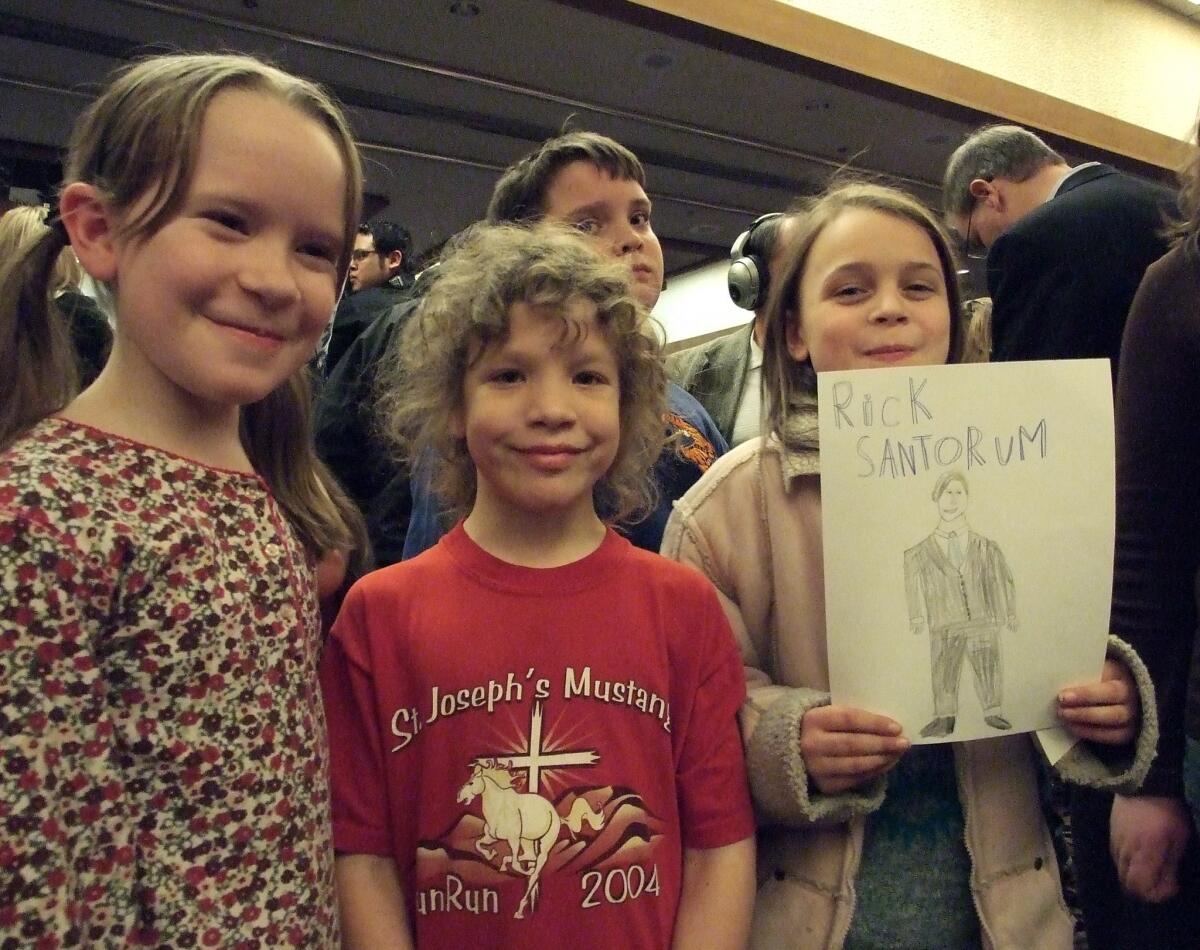 Pasco, Wash. -- At a rally for Rick Santorum, a group of home-school children cheered for the Republican presidential candidate. Coached by her mom, 9-year-old Caitlin Murphy, center, said she liked Santorum because he's pro-life, pro-marriage and a Catholic.