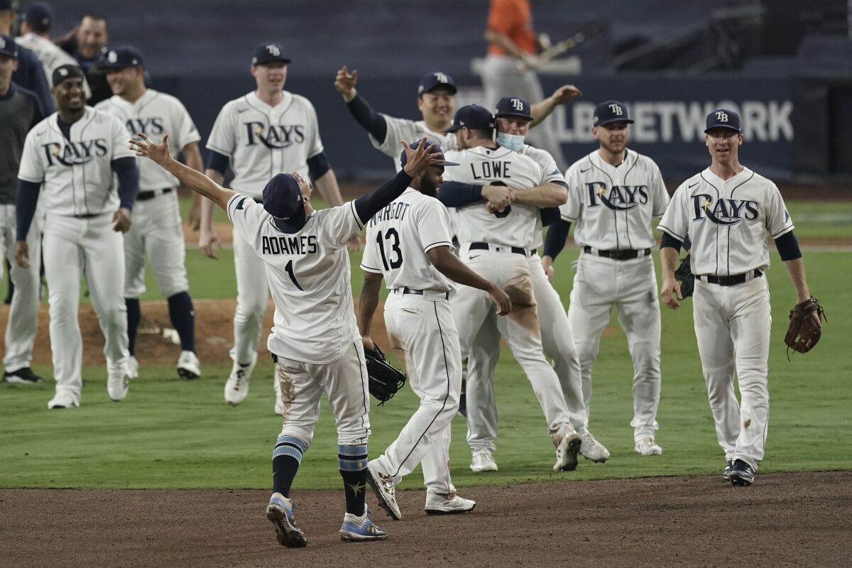 The Tampa Bay Rays celebrate their victory against the Houston Astros in Game 7 of the American League Championship Series.