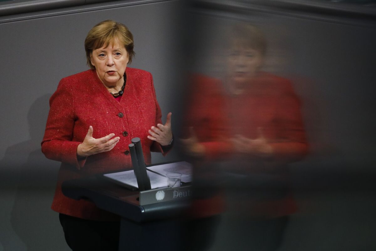 German Chancellor Angela Merkel delivers a speech in the Bundestag in Berlin on Wednesday.