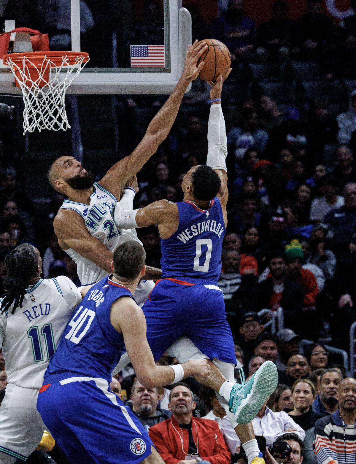 Minnesota center Rudy Gobert blocks a shot by Clippers guard Russell Westbrook during the second half Monday.