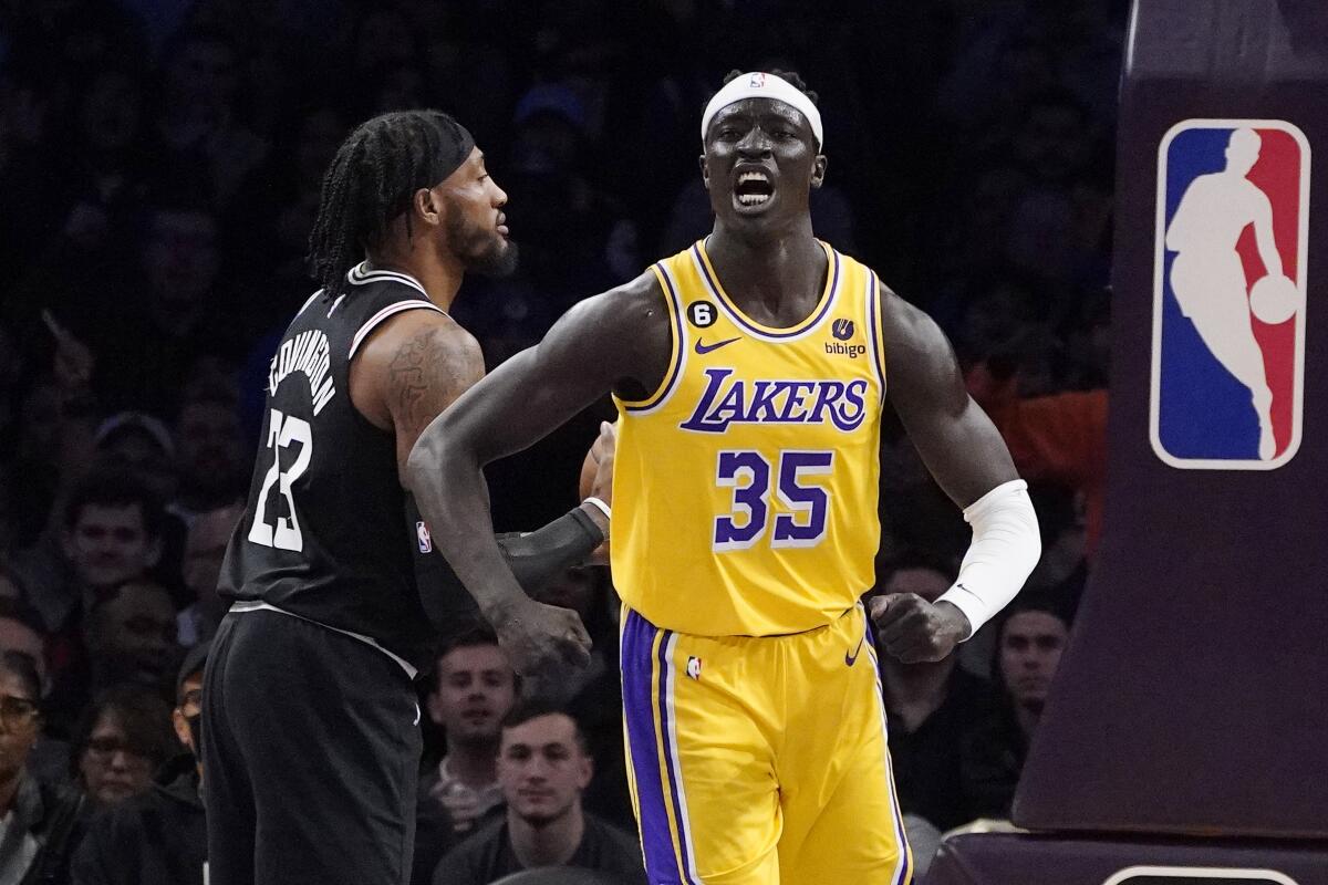 Lakers forward Wenyen Gabriel celebrates after scoring against the Clippers on Jan. 24.