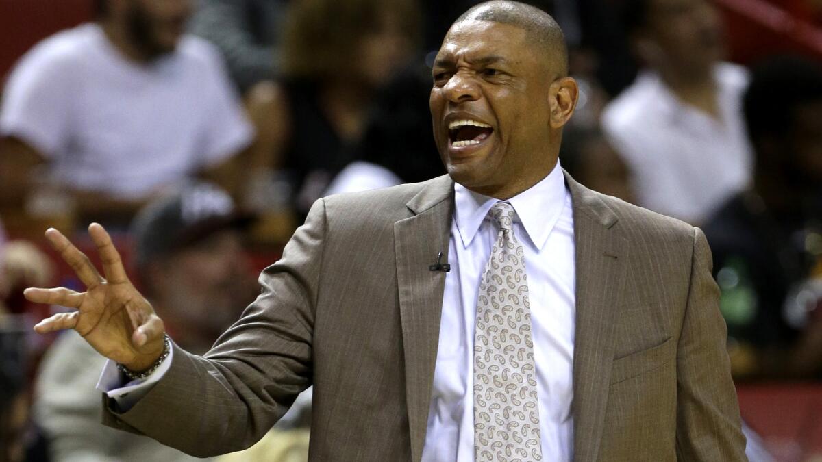 Clippers Coach Doc Rivers calls out instructions during the first half of a game Feb. 7.