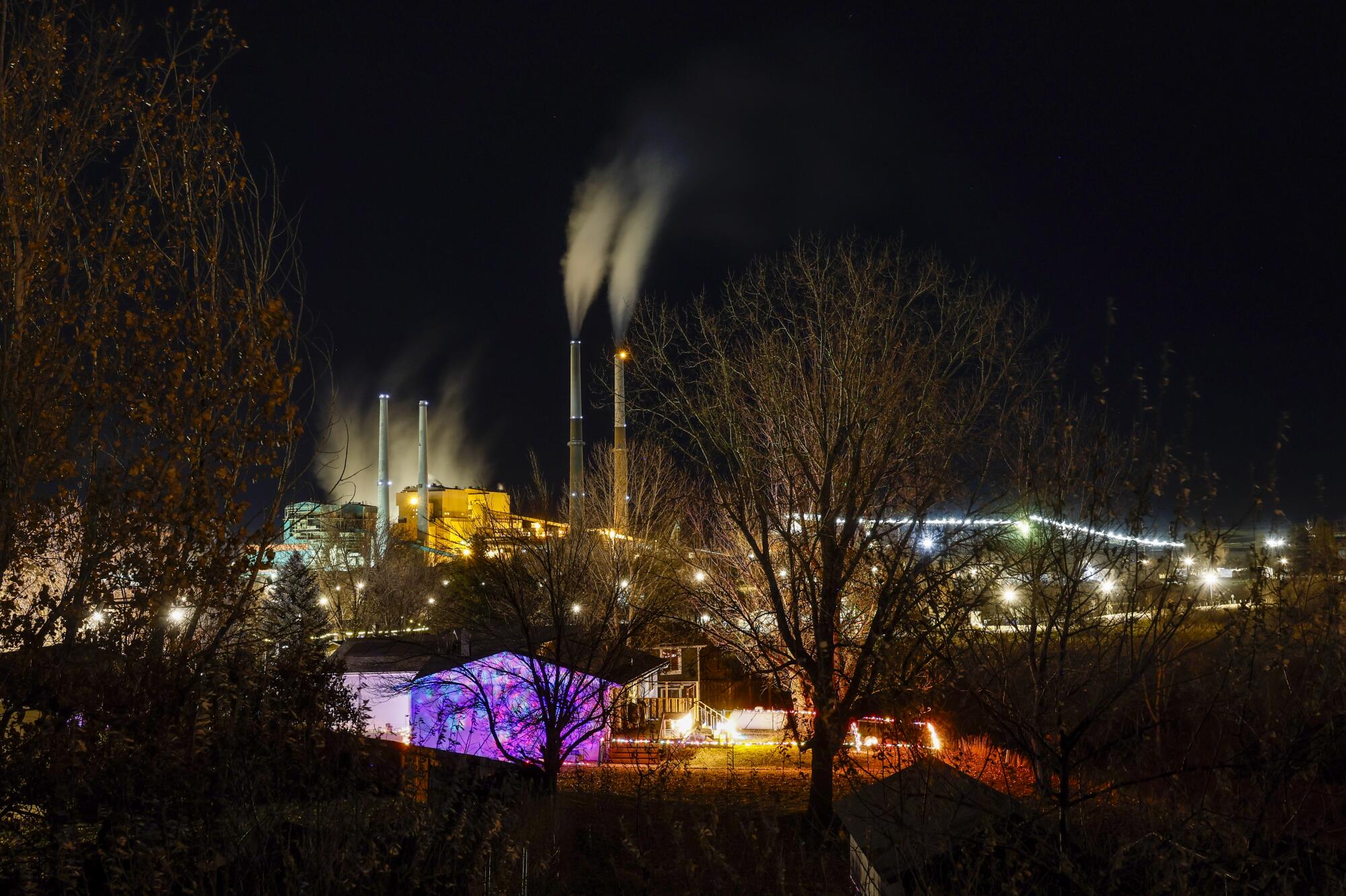 The Colstrip coal plant lights up the night, generating power mostly for Oregon and Washington.