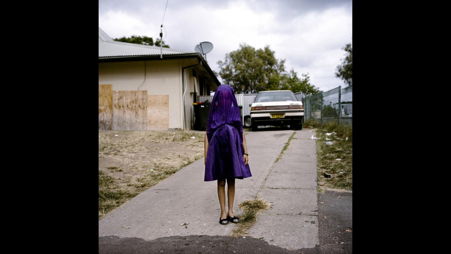 Raphaela Rosella of Australia won the Portraits Category with her shot of Laurinda waiting in her purple dress for the bus that will take her to Sunday school.
