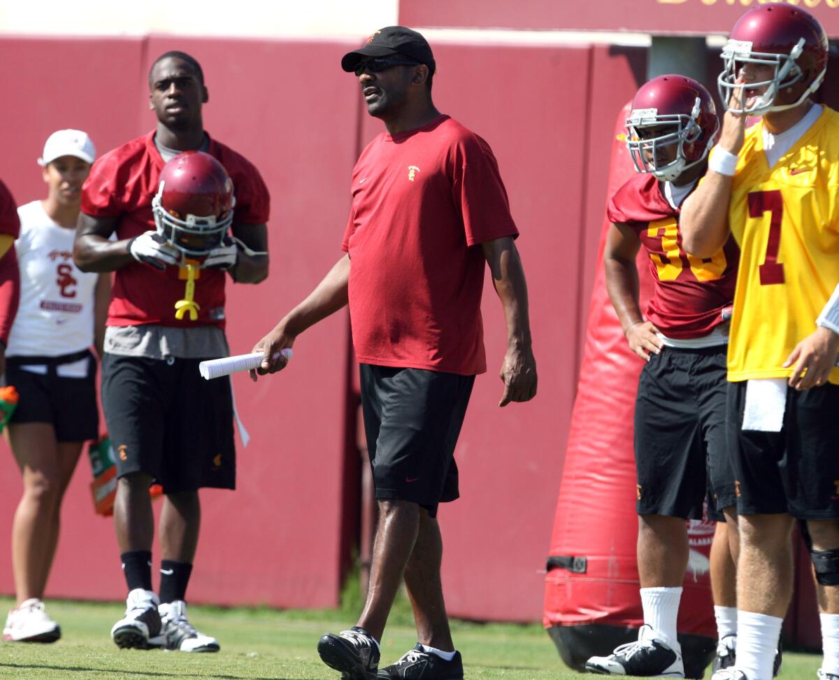 Former USC running backs coach Todd McNair takes part in Trojans' practice in 2009.