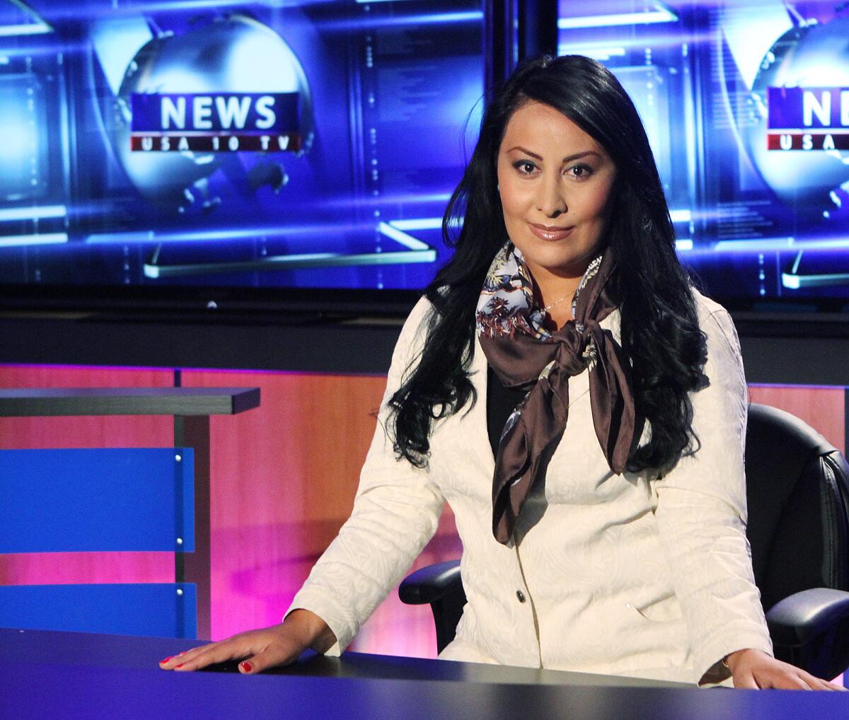 Armine Amiryan, head of the news department at USArmenia Worldwide Armenian Television in studio in Tarzana on Wednesday, Oct. 2, 2013. The station recently purchased property in Glendale and plans to relocate soon from Tarzana.