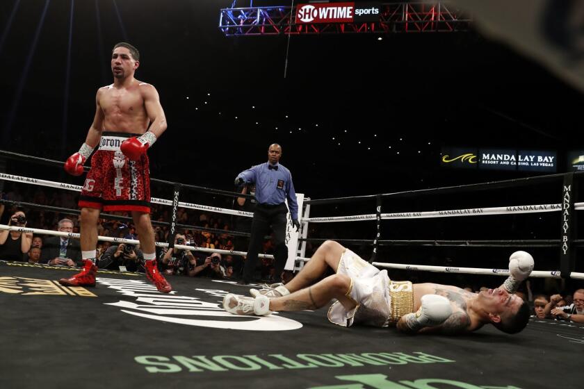 LAS VEGAS, NV - FEBRUARY 17: Danny Garcia (L) heads to a neutral corner after knocking down Brandon Rios during the ninth round of their welterweight boxing match at the Mandalay Bay Events Center on February 17, 2018 in Las Vegas, Nevada. Garcia won the fight with a ninth-round TKO. (Photo by Steve Marcus/Getty Images) ** OUTS - ELSENT, FPG, CM - OUTS * NM, PH, VA if sourced by CT, LA or MoD **