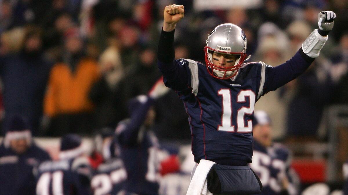 New England Patriots quarterback Tom Brady celebrates the Patriots' 21-12 win against the Chargers during the AFC Championship Game on Jan. 20, 2008.