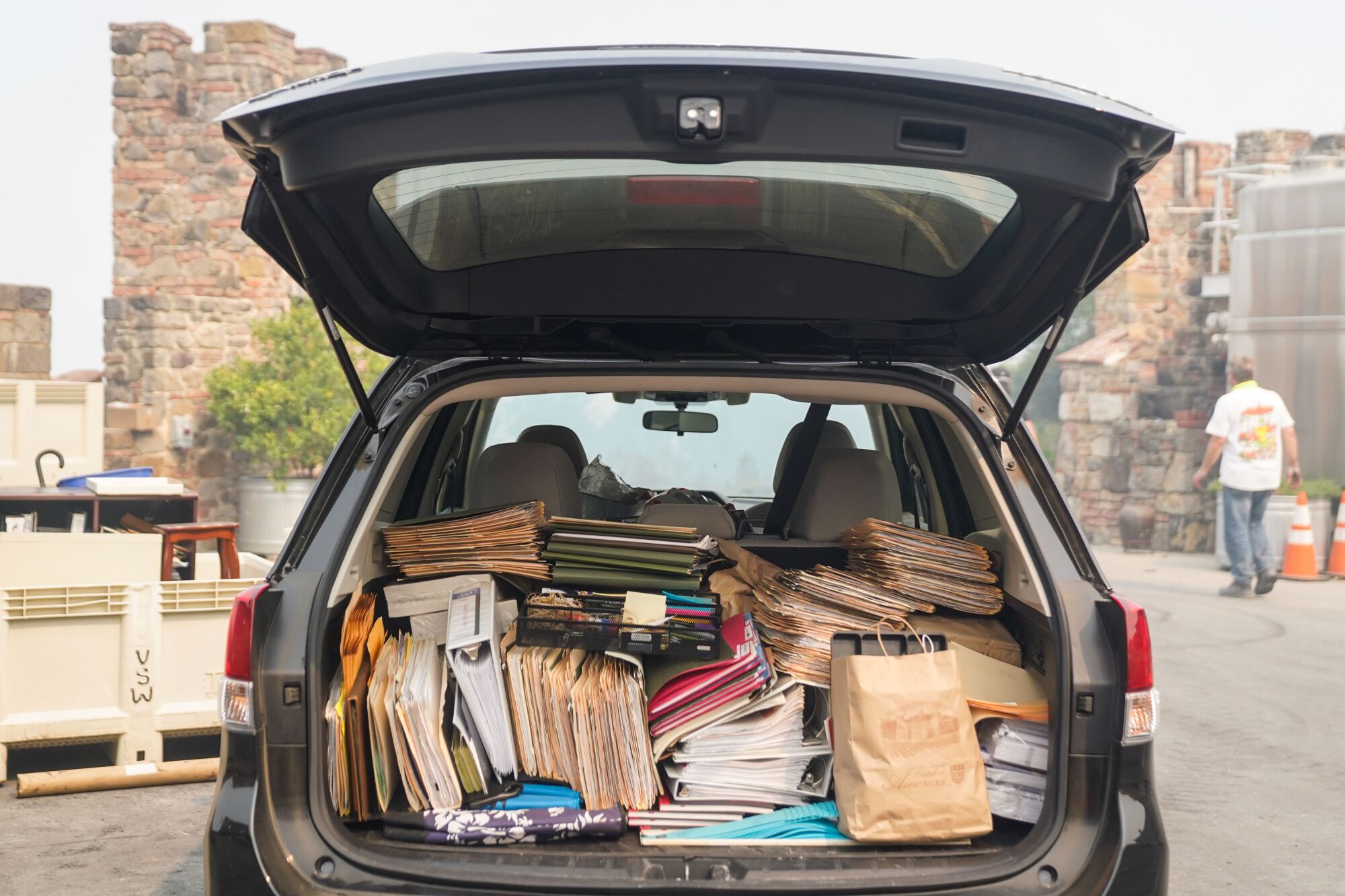 A car trunk is filled with a vineyard's financial and account records saved from the Glass fire.