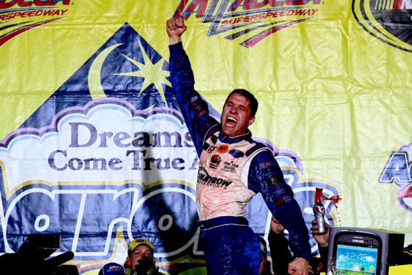 David Ragan celebrates in victory lane after winning at Talladega Superspeedway on Sunday.