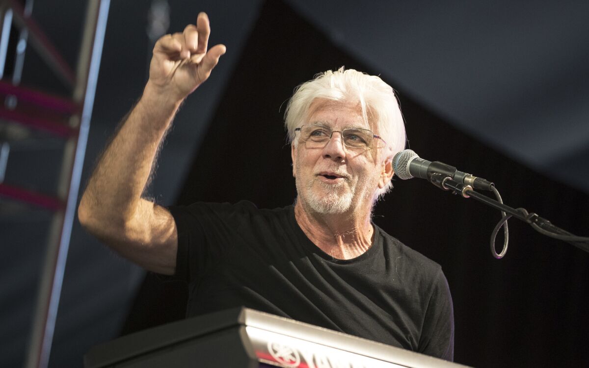 Michael McDonald acknowledges the crowd onstage with Thundercat.