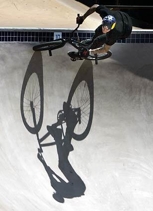 Chris Doyle casts a shadow across the new cement trick bowl constructed in Carson during Wednesday's practice day for X Games 15, which begin Thursday at Staples Center.