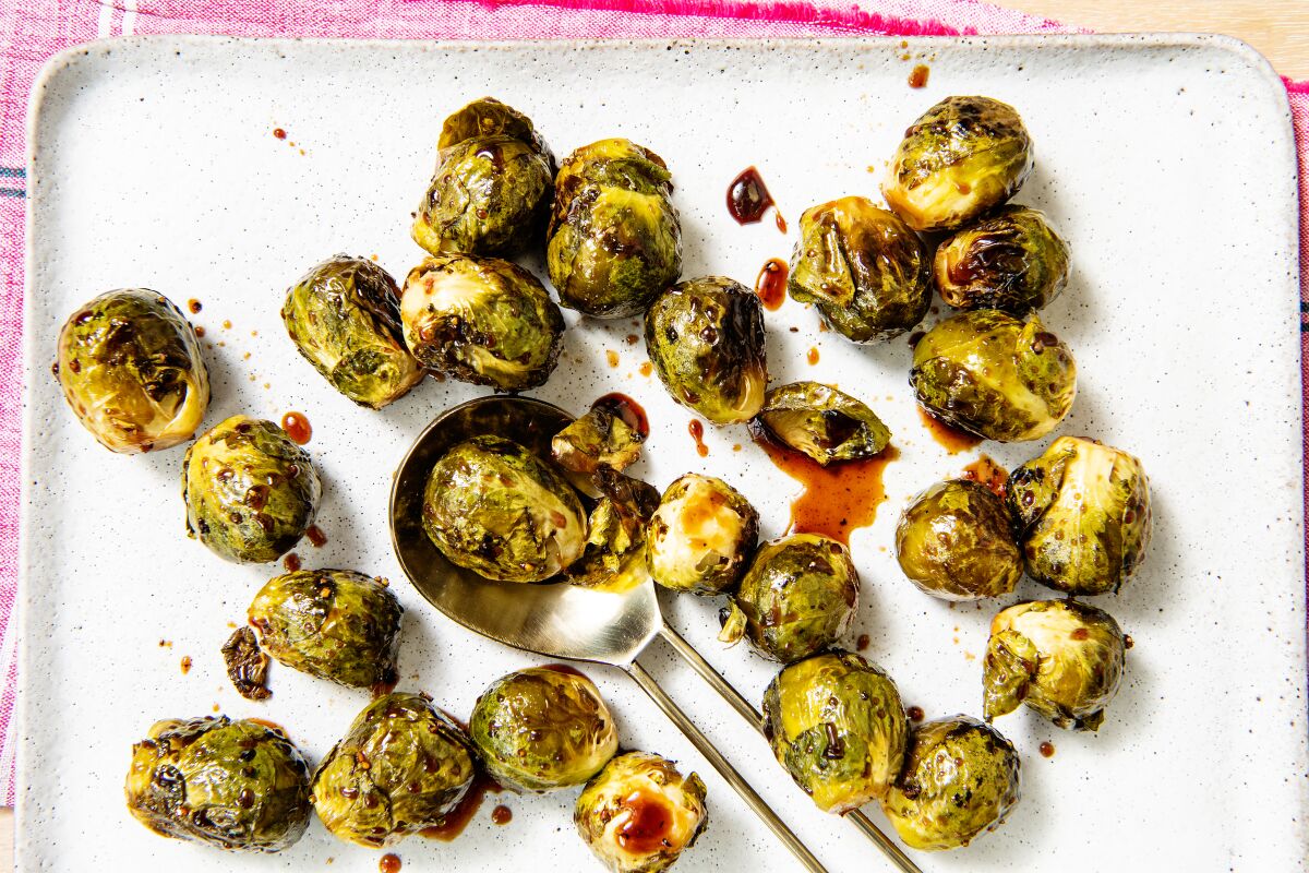 Whole Brussels sprouts glazed with a yakitori-style sauce.