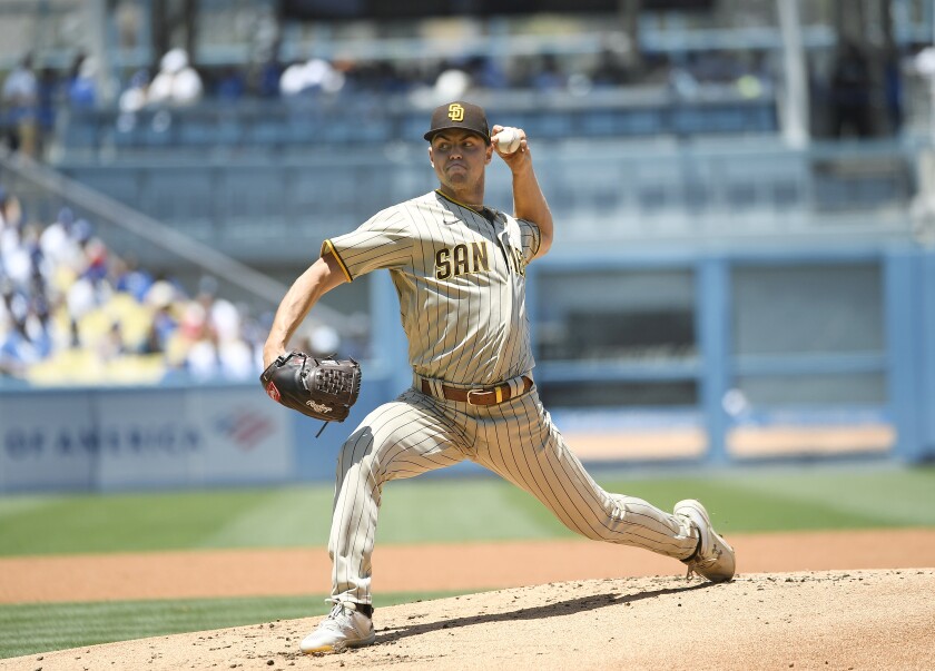 Padres starter MacKenzie Gore throws against the Dodgers on Sunday at Dodgers Stadium in Los Angeles.