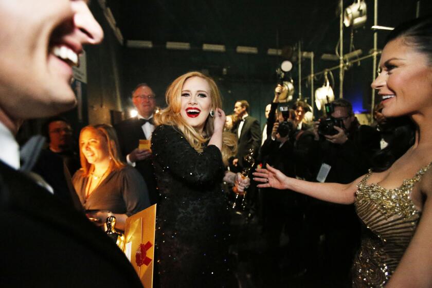 Adele after accepting her Oscar for "Skyfall."