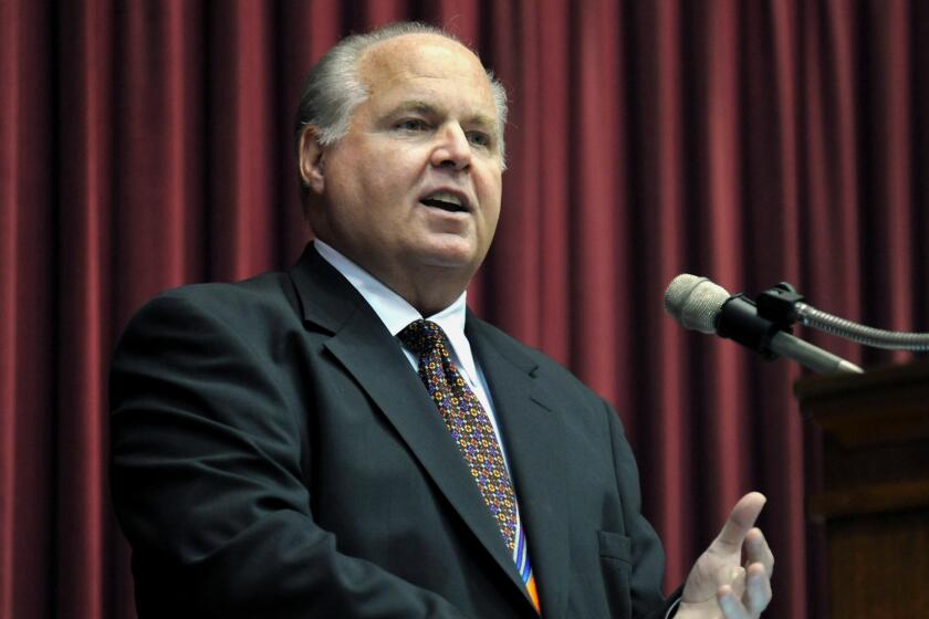 FILE - This May 14, 2012 file photo shows radio host Rush Limbaugh speaking during a ceremony inducting him into the Hall of Famous Missourians in the state Capitol in Jefferson City, Mo. Limbaugh says he’s been diagnosed with advanced lung cancer. Addressing listeners on his program Monday, Feb. 3, 2020, he said he will take some days off for further medical tests and to determine treatment. (AP Photo/Julie Smith, File)