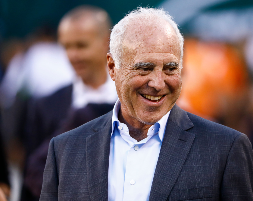 Philadelphia Eagles team owner Jeffrey Lurie walks on the sidelines before a game.