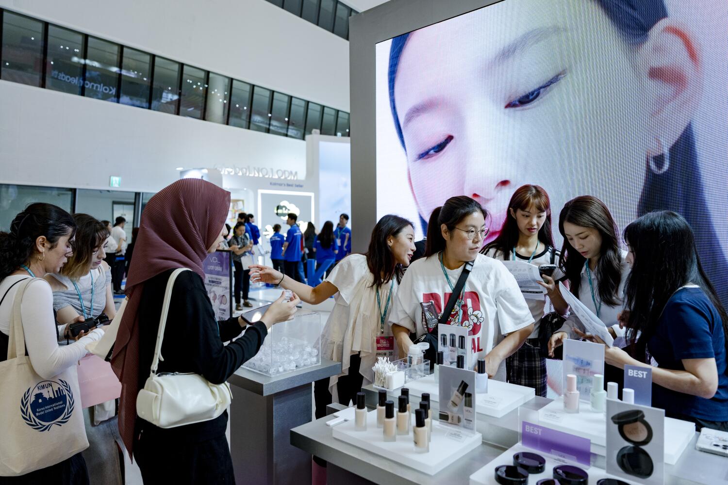 Visitors explore exhibition booths and beauty-related products during Seoul Beauty Week 2025 at Dongdaemun Design Plaza (DDP) in Jung District, Seoul, South Korea, on August 28, 2025. The exhibition features 300 participating companies. (Photo by Chris Jung/NurPhoto via Getty Images)