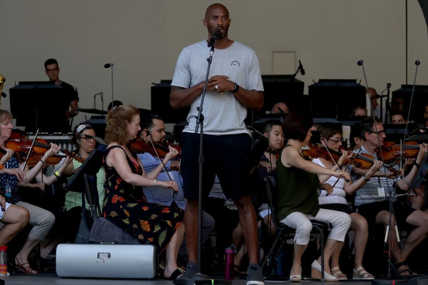 HOLLYWOOD, CALIF. - AUG. 31, 2017. Lakers great Kobe Bryant rehearses with the L.A. Philharmonic on Thursday, Aug. 31, 2017, in preparation for weekend perfomances at the Hollywood Bowl. Bryant was set to narrate "Dear Basketball." a letter that he wrote in contemplation of retirement from the game, and was scheduled to be accompanied by the philharmonic under conductor and composer John Williams. (Luis Sinco/Los Angeles Times)
