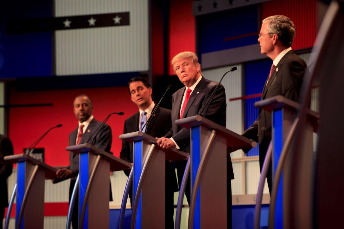 Donald Trump, center, was among the 10 Republican presidential candidates who participated in the party's first debate in Cleveland on Aug. 6.