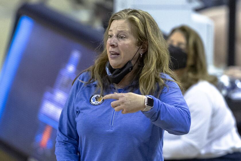 UCLA coach Cori Close watches the team play Wyoming during the second half.