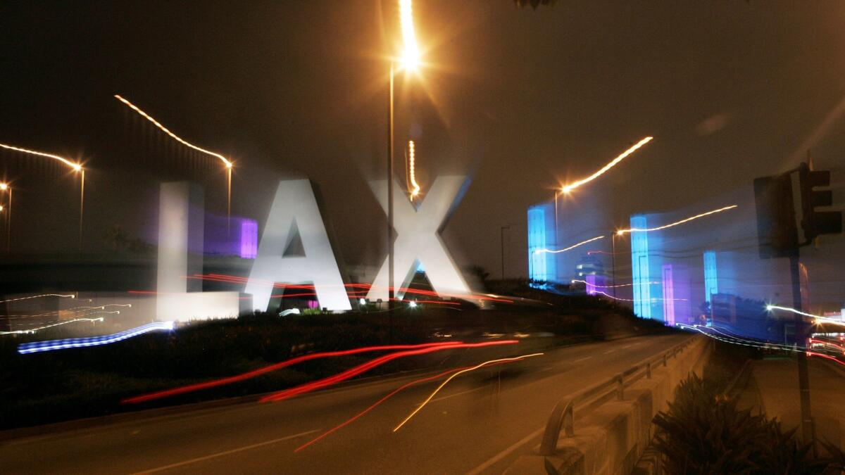 The colorful illuminated pylons around the entrance to LAX