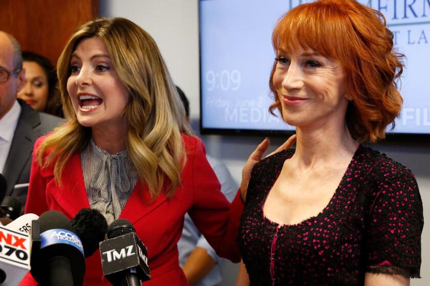 WOODLAND HILLS, CA - JUNE 2, 2017 --Comedian Kathy Griffin with her attorney, Lisa Bloom, and criminal defense attorney Dmitry Gorin, left, talk at a news conference in Woodland Hills June 2, 2017 to discuss the comedian's "motivation" behind a much-criticized photo of her holding what appeared to be the bloodied head of President Donald Trump, and respond "to the bullying from the Trump family she has endured." (Al Seib / Los Angeles Times)