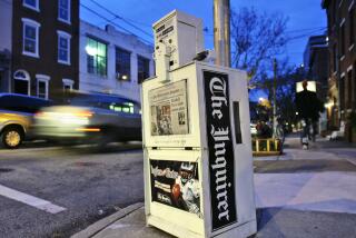 FILE - A Philadelphia Inquirer newspaper vending machine stands in Philadelphia on Nov. 30, 2006. The Philadelphia Inquirer experienced the most significant disruption to its operations in 27 years due to what the newspaper calls a cyberattack on Sunday, May 14, 2023. The company was working to restore print operations after a cyber incursion that prevented the printing of the newspaper's Sunday print edition, the Inquirer reported on its website. (AP Photo/Matt Rourke, File )