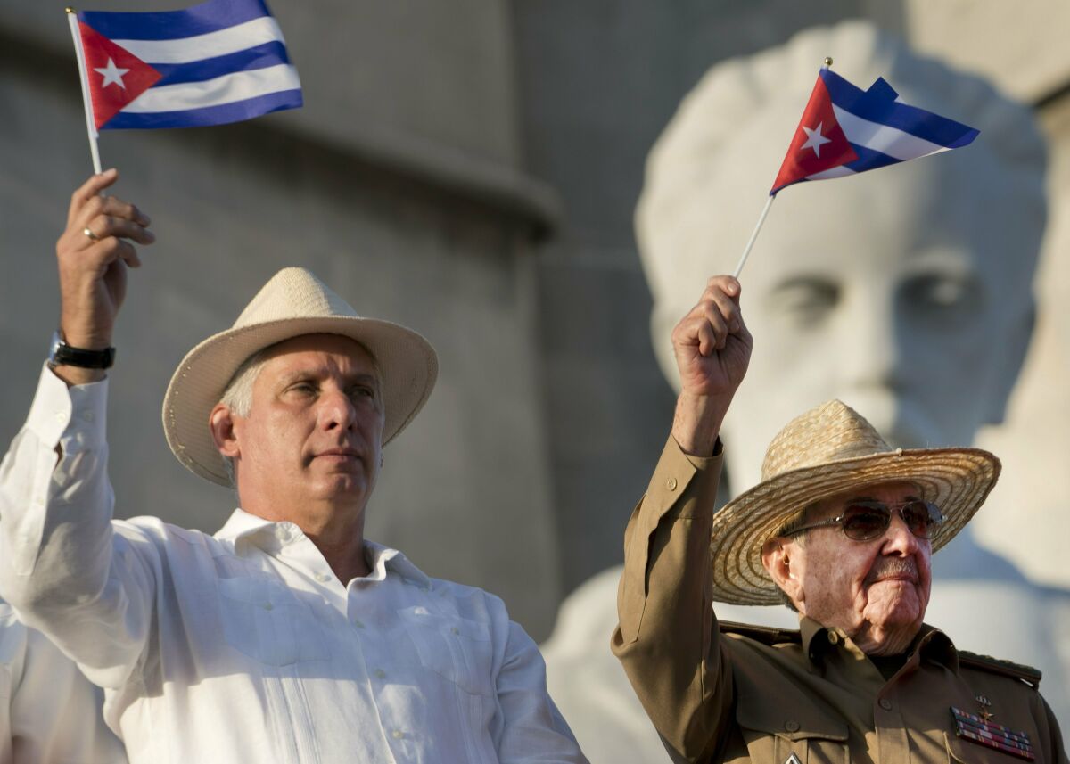 Cuba's President Miguel Diaz-Canel, left, and former President Raul Castro at the May Day parade in 2019. 
