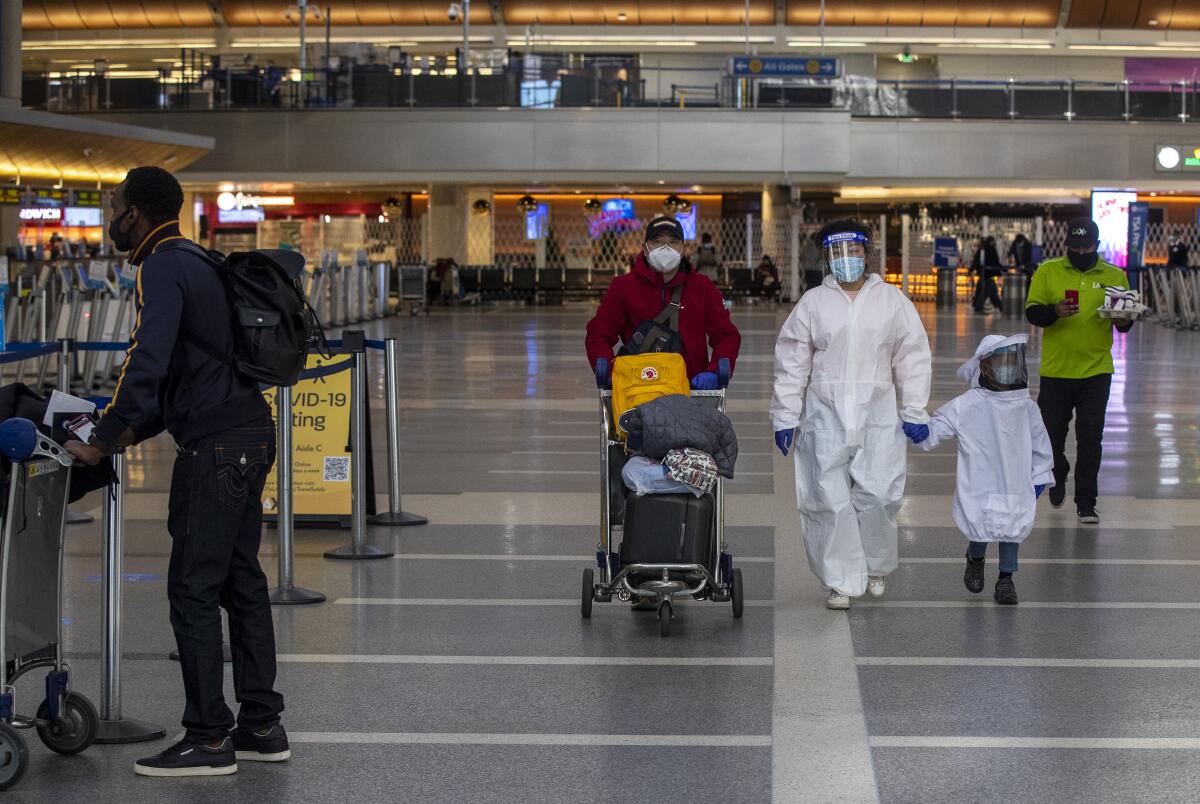 Some New Year's Eve travelers took their personal protection seriously inside the Tom Bradley International Terminal at LAX. 